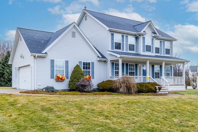 view of front of home with covered porch, roof with shingles, a front yard, and a garage