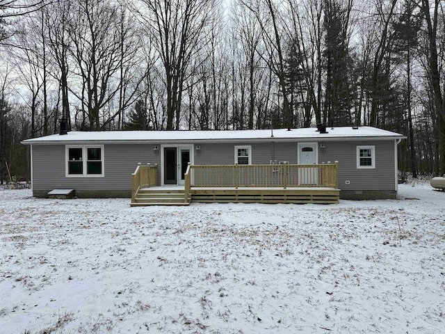 view of front of property featuring crawl space and a wooden deck