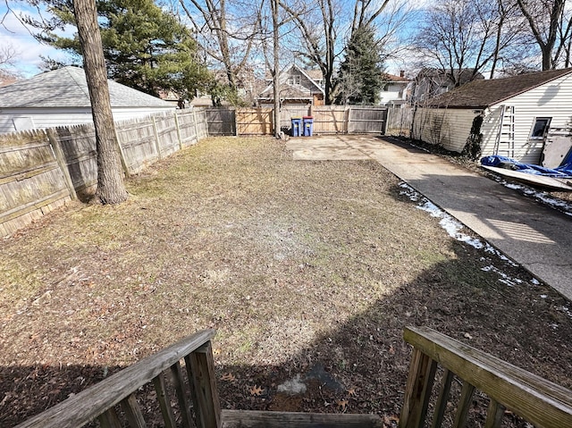 view of yard with a fenced backyard