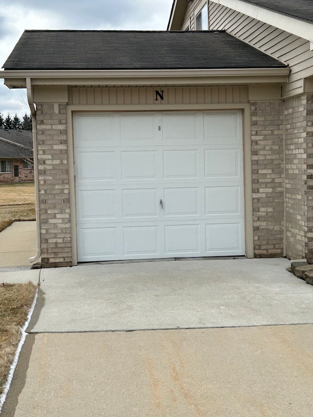 garage with driveway