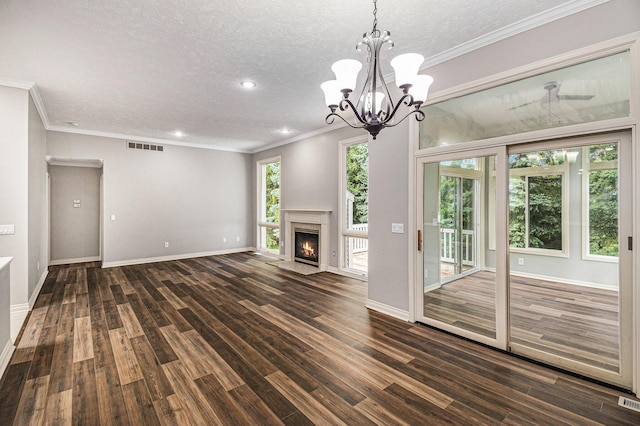 unfurnished living room featuring dark wood-style flooring, a fireplace, visible vents, a textured ceiling, and baseboards