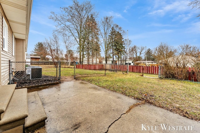 view of yard with fence and cooling unit