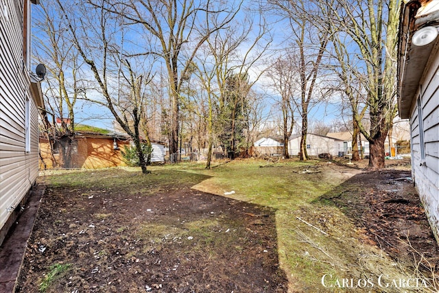 view of yard with fence