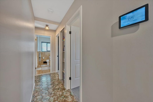 hallway featuring tile patterned floors