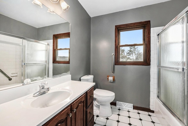 full bath with tile patterned floors, visible vents, toilet, baseboards, and vanity