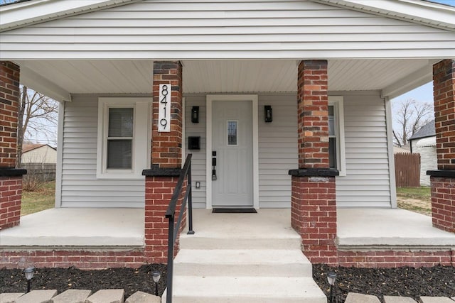 doorway to property with a porch