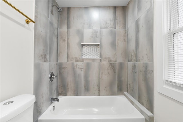 full bath with shower / bath combination and toilet