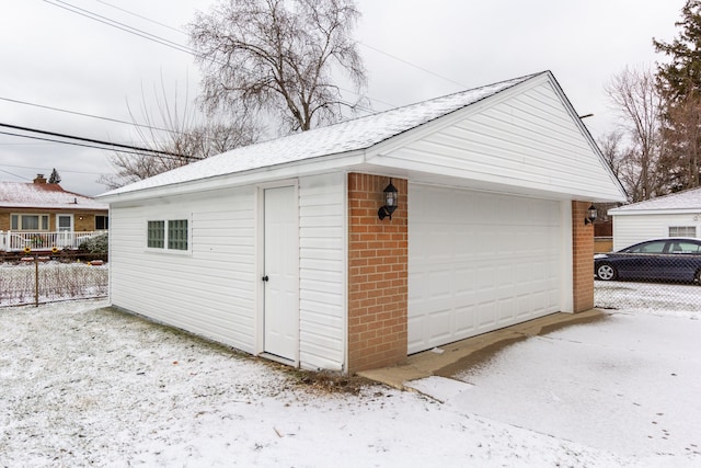 detached garage with fence