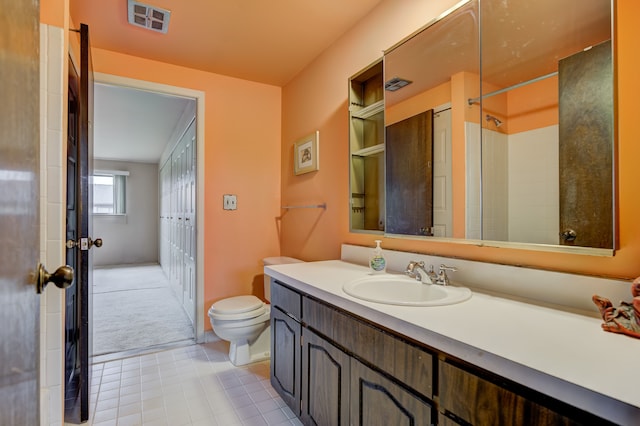 full bath featuring tile patterned floors, visible vents, toilet, and vanity