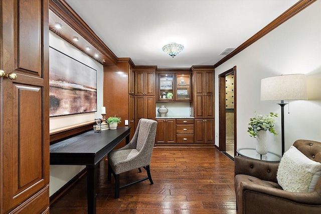 office space with dark wood-style floors, visible vents, ornamental molding, and baseboards