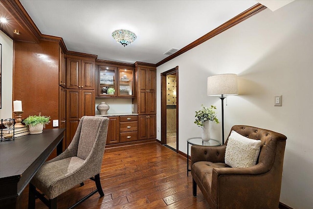 office space featuring baseboards, crown molding, visible vents, and dark wood-style flooring