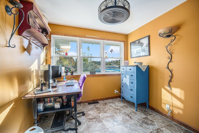 office with visible vents and baseboards