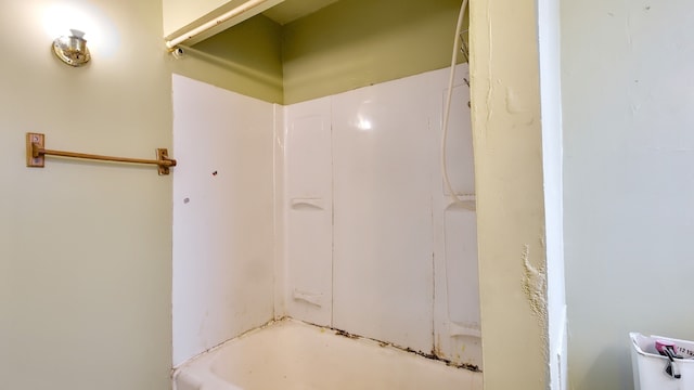 bathroom with walk in shower and a tub