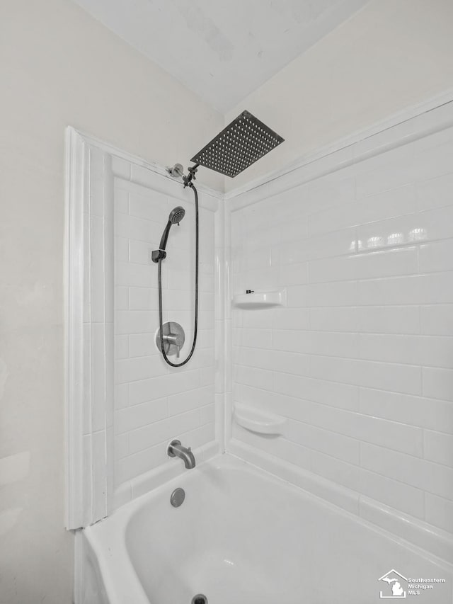 bathroom featuring washtub / shower combination