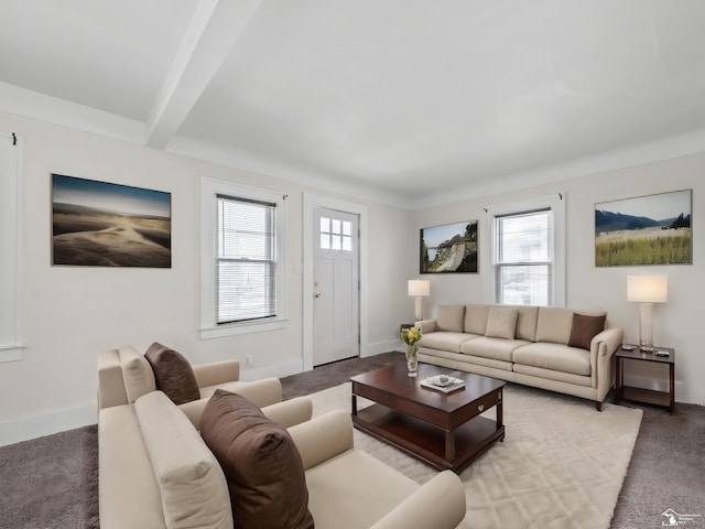 living room with light carpet, baseboards, and beamed ceiling