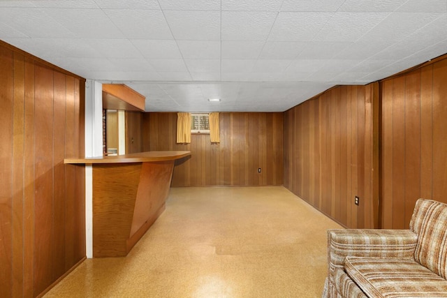 bar with wooden walls and a dry bar