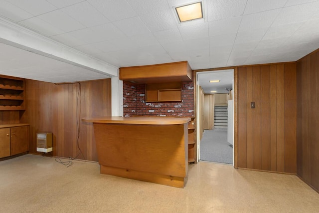 kitchen with wooden walls