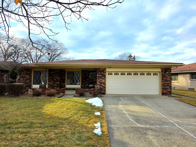 single story home featuring a front lawn, concrete driveway, brick siding, and an attached garage