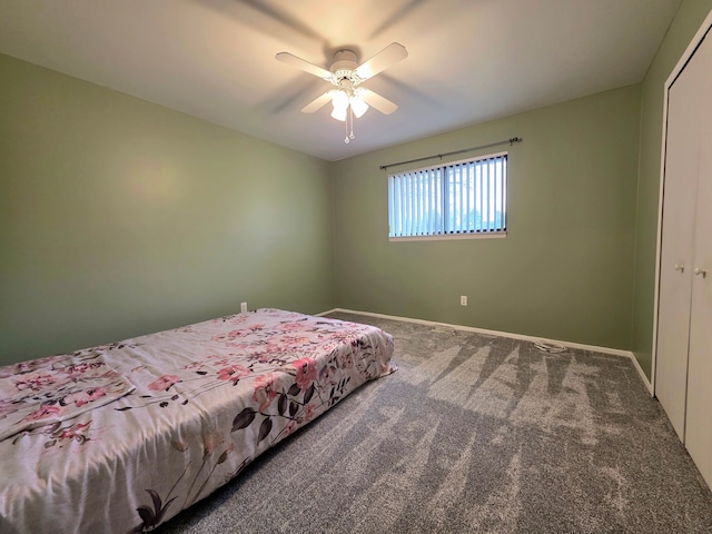 bedroom with ceiling fan, a closet, carpet, and baseboards