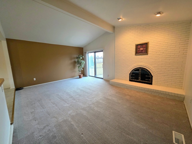 unfurnished living room featuring carpet floors, a fireplace, vaulted ceiling with beams, and visible vents