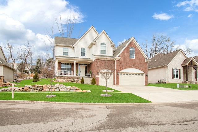 traditional-style home featuring an attached garage, covered porch, brick siding, concrete driveway, and a front yard