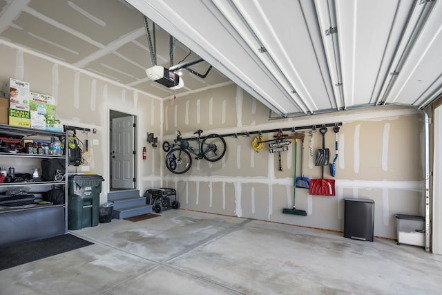 garage featuring a garage door opener