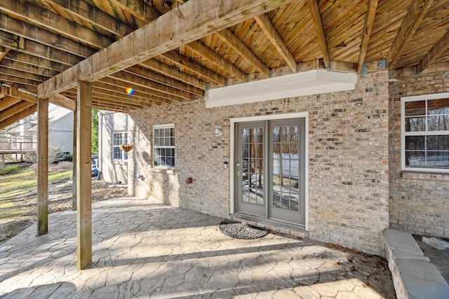 entrance to property with a patio area