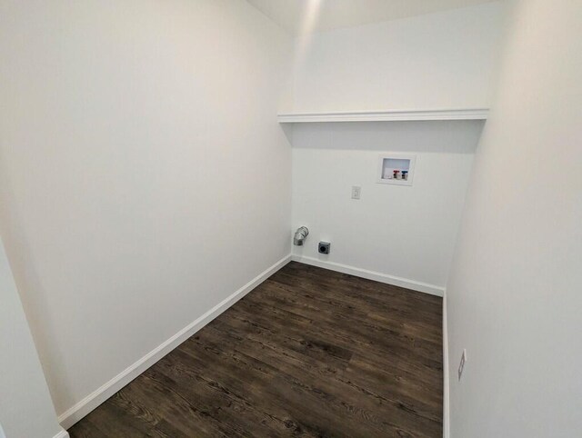 washroom with laundry area, dark wood-type flooring, hookup for a washing machine, and baseboards