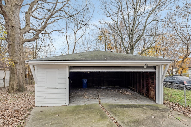 detached garage with fence