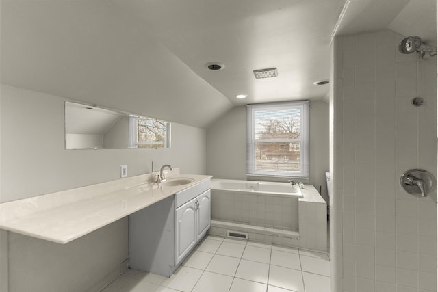 bathroom featuring vaulted ceiling, visible vents, vanity, and a healthy amount of sunlight