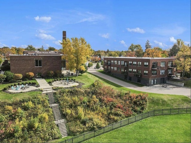 exterior space featuring fence, a patio, and a yard