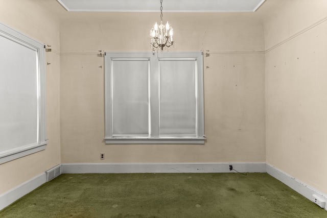 carpeted empty room with visible vents and baseboards