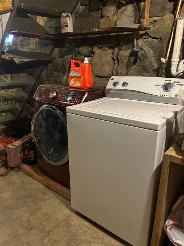 laundry area featuring laundry area and washer and dryer