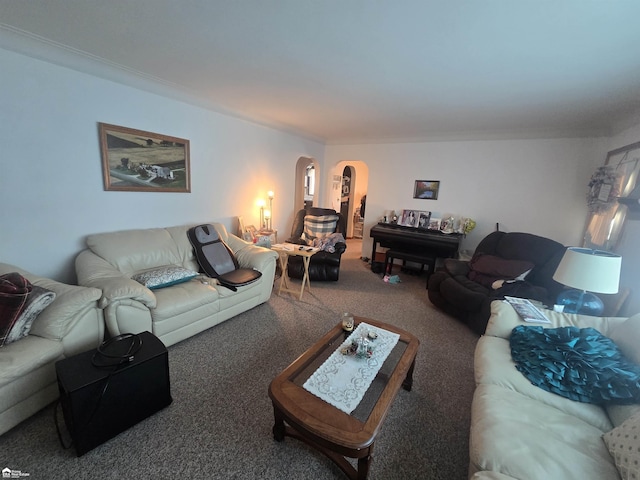 living room featuring carpet floors and arched walkways