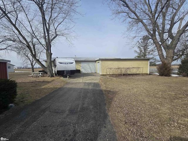 exterior space featuring an outbuilding