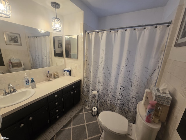 bathroom featuring tile walls, curtained shower, decorative backsplash, toilet, and vanity