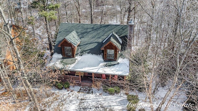 view of outbuilding featuring covered porch