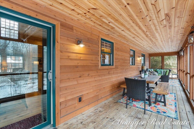 sunroom featuring wooden ceiling