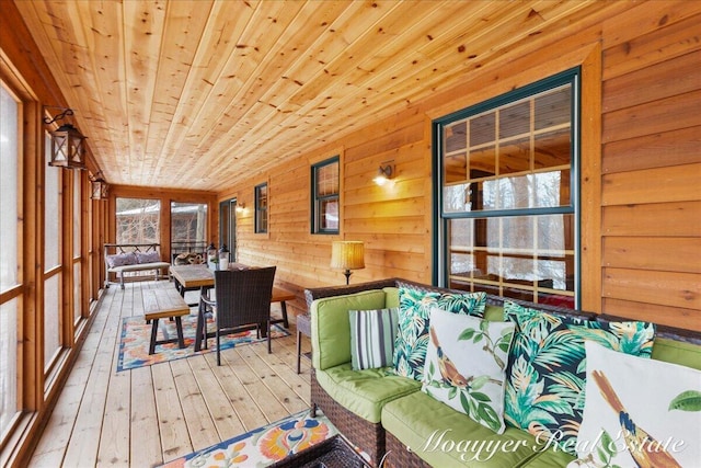 sunroom featuring wooden ceiling