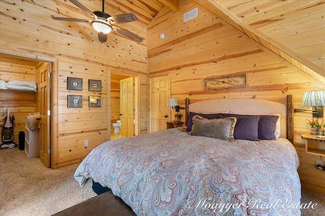 bedroom with carpet floors, wooden ceiling, vaulted ceiling, and wooden walls