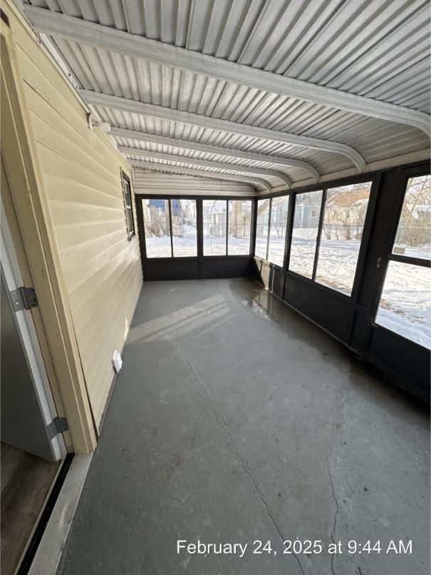 view of unfurnished sunroom