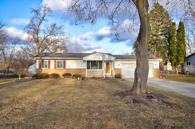 single story home featuring driveway, a chimney, an attached garage, and a front yard