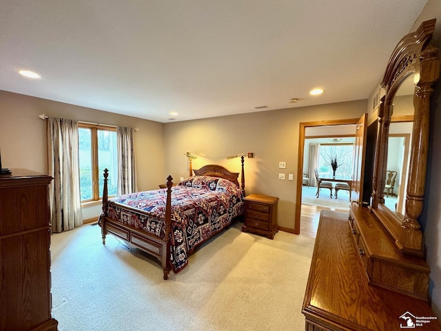 bedroom with recessed lighting, visible vents, baseboards, and light colored carpet