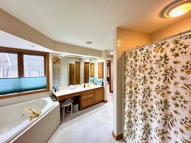 bathroom featuring a whirlpool tub, visible vents, tiled shower, and vanity