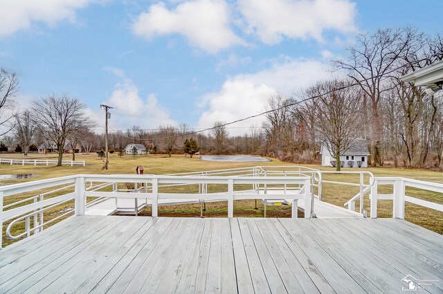 deck featuring a lawn