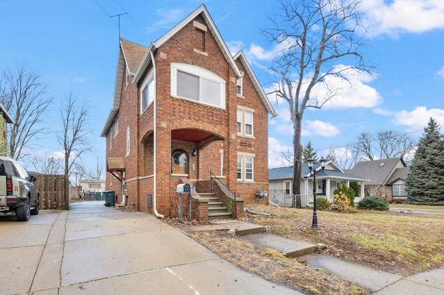 2412 Cornell St, Dearborn, MI 48124 - view of front of property featuring brick siding and fence