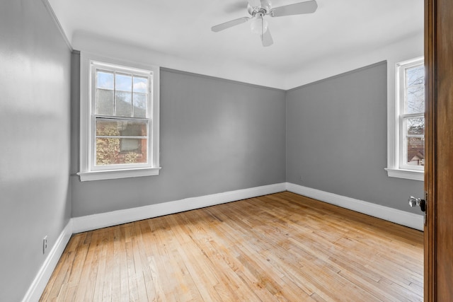 2412 Cornell St, Dearborn, MI 48124 - unfurnished room featuring ceiling fan, baseboards, and hardwood / wood-style flooring