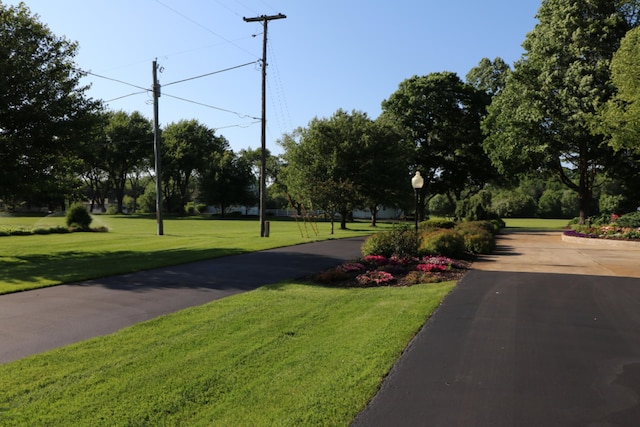 surrounding community with a lawn