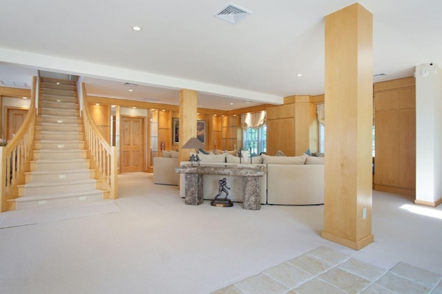 living area featuring recessed lighting, visible vents, light colored carpet, and stairway