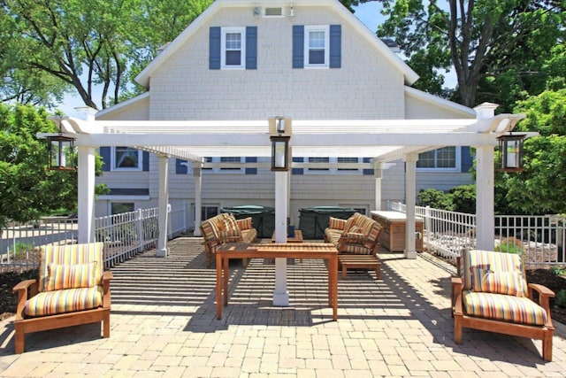 back of house featuring an outdoor hangout area, a patio area, fence, and a pergola